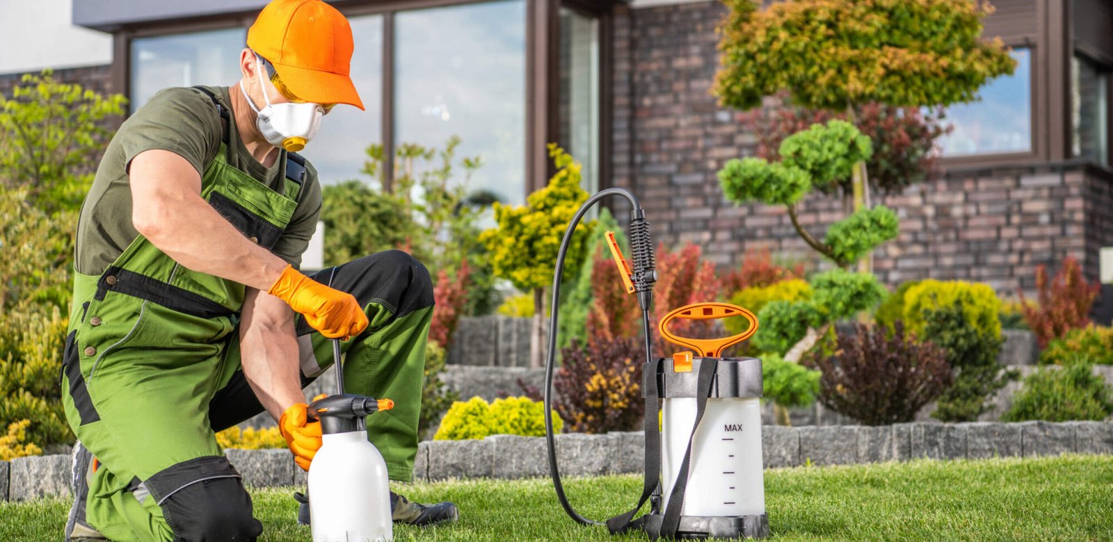 Landscaper Preparing To Perform Pest Control Treat U6QEC62 Scaled 1 2000x975
